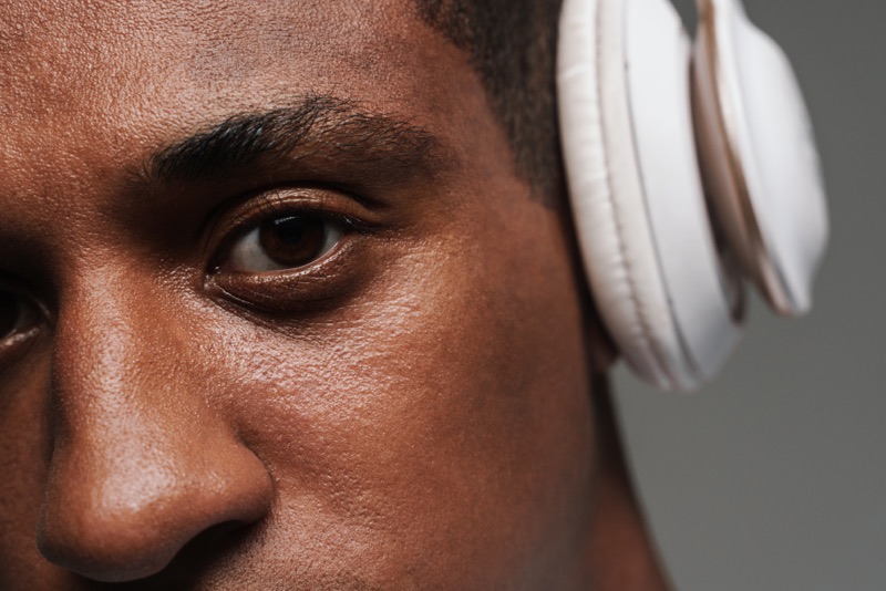 Close-up of a man wearing headphones